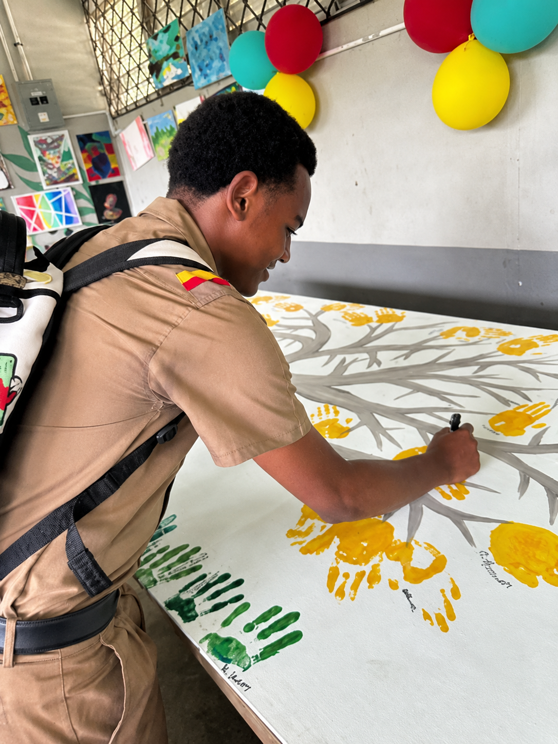 Student participating in an art activity